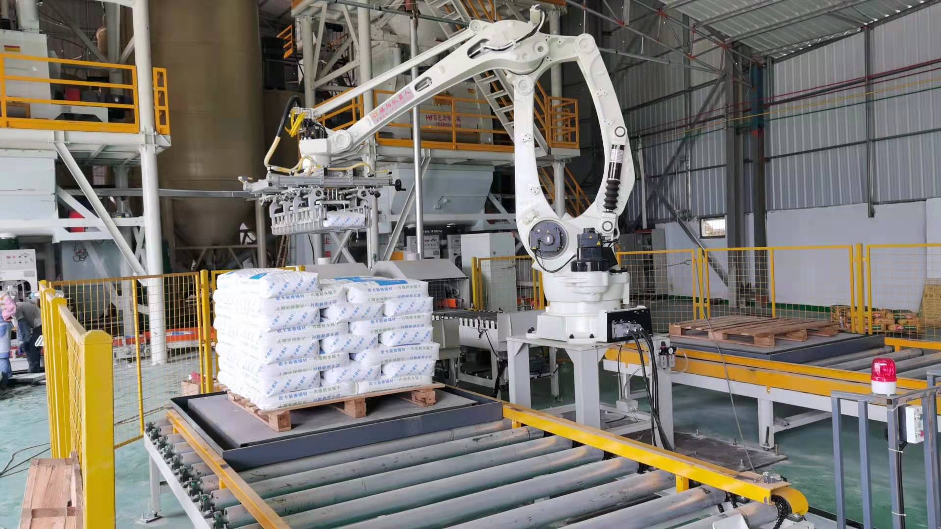 <strong>工業(yè)鹽l氯化鈉全自動稱重包裝機(jī)碼垛機(jī)器人，自動化生產(chǎn)線</strong>